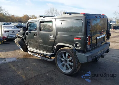 2003 Hummer H2 z USA, uszkodzony, nr VIN 5GRGN23U73H114611